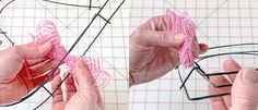 two hands are working with wire and yarn to make an origami butterfly decoration