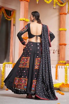 Shubhkala Black Exclusive Embroiered Work Fancy Chaniya Choli The Shubhkala Black Exclusive Embroidered Work Fancy Chaniya Choli is a stunning traditional outfit that combines elegance and sophistication. Perfect for special occasions, this ensemble features intricate embroidery work that adds a touch of luxury and grace. The rich black fabric and the elaborate design make it a standout choice for any festive event or celebration. Key Features Elegant black color with exquisite embroidery work Traditional Chaniya Choli design with modern touches High-quality fabric ensures comfort and durability Perfect for weddings, festivals, and special occasions Specifications Chaniya Choli Set Size: Available in various sizes Color: Black Occasion: Festive, Wedding, Special Events Material & Care Mate Garba Dress, Chaniya Choli Designs, Choli Designs, Navratri Special, Chaniya Choli, Black Fabric, Traditional Outfits, Quality Fabric, Special Occasion