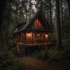 a cabin in the woods with stairs leading up to it