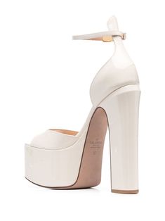 Find VALENTINO Tan-go 160mm Platform Sandals on Editorialist. ivory white patent calf leather open toe platform sole buckle-fastening ankle strap branded insole high heel platform sole High Heel Platform, Leather Block Heels, Block Heels Sandal, Ivory White, Platform Sandals, Valentino Garavani, Heeled Mules, High Heel, Calf Leather