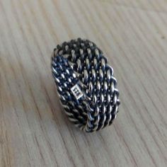 Material: 925 Sterling Silver Approximate weight: 8,00 gr. ± 1,00 gr. Top width: 0.9 cm (0.36 inches) You can give the desired ring size from the options. This exclusive Sterling Silver Bohemian Wedding Ring features a Unisex Handwoven Braid pattern in a wide width measuring 9 mm (approximately 0.36 inches) in width. We are happy to create this band for you in a variety of ring sizes and finishes. SIZE: All sizes are available. If you want an extra big size (out of cart) please ask for availabil Sterling Silver Fine Jewelry Chain Ring, White Gold Rings With Oxidized Finish, Elegant Braided Silver Jewelry, Braided Copper Rings Wedding, Adjustable Hand-strung Silver Braided Bracelet, Bohemian Wedding Rings, Adjustable Silver Braided Bracelet, Hand-strung, Braided Wedding Band, Silver Braided Ring