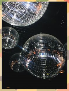 shiny disco balls hanging from the ceiling