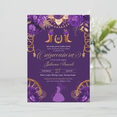 a purple and gold wedding card with flowers