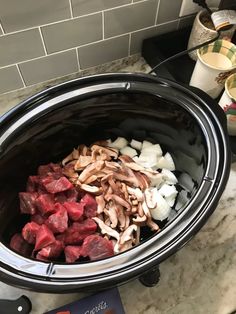 the food is in the crock pot ready to be put into the slow cooker