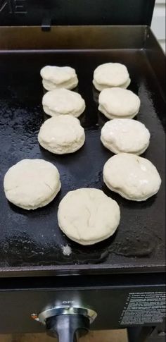 the buns are being cooked on the griddle in the oven for them to cook