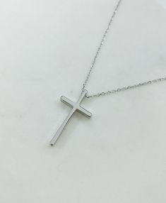 "Silver cross necklace, cross necklace, religious necklace cross, religious gift, simple cross necklace, silver necklace, religious gifts women Simple and elegant shiny silver plated cross necklace. D E T A I L S: * Silver plated cross pendant charm 13mm x 23mm * Silver plated chain *Lobster clasp closure *Shown at 18\" length SHIPPING: *Free domestic shipping on all orders PACKAGING: *All pieces come beautifully packaged, perfect for gift giving. Find more to ❤️ here: http://etsy.com/shop/theje Everyday Minimalist Cross Pendant Necklace, Minimalist Daily Wear Cross Pendant Necklace, Minimalist Everyday Cross Necklace, Simple Everyday Cross Pendant Necklace, Simple Everyday Cross Necklace, Simple Sterling Silver Cross Pendant Necklace, Simple Cross Necklace Silver, Simple Cross Necklace, Orders Packaging