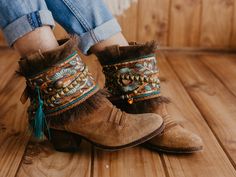 Fringe Boot Covers with Hand-Embroidered Floral Motifs - Boho Chic Boot Accessories for Women Add a touch of handcrafted charm to your favorite boots with these gorgeous fringe boot covers. Inspired by bohemian style, these accessories are perfect for women who love to stand out with unique, artisanal details. Whether you're dressing up for a special occasion or looking to elevate your everyday look, these boot covers are the ideal choice. Crafted with love and attention to detail, each boot cov Embroidered Winter Festival Boots, Winter Festival Embroidered Boots, Brown Bohemian Embroidered Boots, Bohemian Embroidered Boots For Festival, Boho Style Boots, Boho Chic Boots, Amber Heart, Boot Covers, Trending Topic