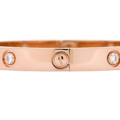 This is an authentic CARTIER 18K Pink Gold 10 Diamond LOVE Bracelet size 17. The bracelet is crafted of 18 karat pink gold and features ten round brilliant cut diamonds along the band weighing approximately .96 total carat weight. The bracelet also features the screw system that prevents the loss of the screws when opening the bangle. Diamond Love Bracelet, Rose Gold Bangle Bracelet, Cartier Jewelry, Love Bracelet, Cartier Love, Gold Bangle Bracelet, Rose Gold Bracelet, Love Bracelets, Round Brilliant Cut Diamond