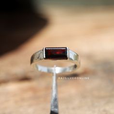 Natural Garnet Ring, Men's Ring, 925 Sterling Silver Ring, Handmade Ring, Engagement Ring, Gift For Him, Wedding Ring, Dainty Men's Jewelry  Metal: 925 Sterling Silver Gemstone : Garnet Stone Color : Red Stone Shape : Baguette Stone Setting: Bezel Benefits of wearing Garnet:- Those who can prosper by wearing the stone include people engaged in cosmetic trade, lottery sellers, share market dealers, professionals in film and television serial sectors and staff of chemical laboratories. People born Men’s Engagement Ring, Red Engagement Ring, Wedding Ring Dainty, Garnet Wedding Rings, Garnet Wedding, Ring Boy, Red Rings, Jewelry Metal, Silver Wedding Rings