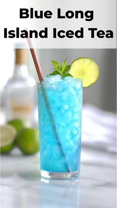 blue long island iced tea in a tall glass with lime and mint garnish