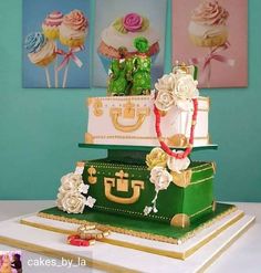 a three tiered cake is decorated with flowers