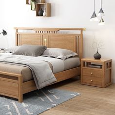 a bed sitting on top of a wooden floor next to a night stand and nightstand