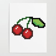 a piece of art that looks like pixelated cherries on a white paper background