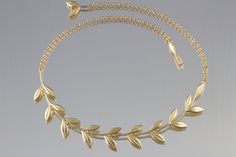 Silver Necklace - Elegant double-leaf links gracefully follow the curves of the neck finished with a chain and leaf hook & clasp. Inspired by Caesars laurel wreath, a symbol of triumph and victory.<br><br>17l, leaf portion measures 0.63w. Available in bright or oxidized sterling silver, or 18k gold vermeil. Yellow Gold Leaf-shaped Formal Jewelry, Elegant Leaf-shaped Jewelry For Formal Occasions, Elegant Leaf-shaped Formal Jewelry, Formal Yellow Gold Leaf-shaped Jewelry, Formal Yellow Gold Leaf Jewelry, Wreath Necklace, Necklace Elegant, Laurel Wreath, Hook Clasp