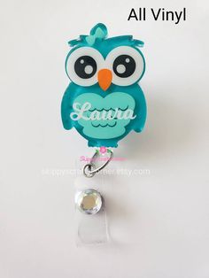 "Owl badge reel 🦉 This owl is a perfect way to bring a little bling to your badge reel and workplace. They also make the perfect gift for night shift nurses, teachers, or anyone who wears a badge reel! This listing is for one (1) retractable Owl badge reel. It comes with the badge reel and owl already attached to it and ready to be used. The owl is made of acrylic and measures 2\" heigh. The design is completely sealed and are easily disinfected. You can choose the color of your owl. You can pi Cute Personalized Badge Reel For Gifts, Personalized Cute Badge Reel For Gift, Personalized Fun Badge Reel For Gift, Personalized Fun Badge Reel Gift, Personalized Blue Badge Holders For Personal Use, Personalized Novelty Badge Reel For Gift, Customizable Blue Badge Holders For Gifts, Personalized Blue Badge Reel For Gift, Personalized Blue Badge Holders For Gifts