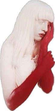 a woman with long white hair and red gloves