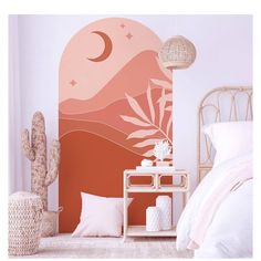 a bedroom scene with focus on the bed and wall mural, along with cactus decor