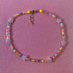 A bright necklace with pearly pink stars Neon Beaded Necklace, Neon Stars, Bright Necklace, Diy Choker, Bead Charms Diy, Vanilla Girl, Bead Choker, Pink Stars, Beaded Necklaces