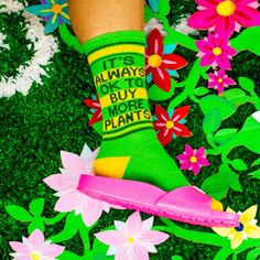 It's Always Ok To Buy More Plants Socks by Gumball Poodle are the perfect gift for that socks lover in your life. These funny themed mens,womens,unisex crew^xl socks come in color and feature the words "It's Always Ok To Buy More Plants" printed on the socks. These socks fit Women's size 6 US to Men's Size 15. Made of Cotton-polyester-spandex-rubber blend for comfort and durability. A pair of these cool Funny novelty Socks will certainly give any wardrobe an instant upgrade. Machine Wash Cold Wi Trendy Green Cotton Socks, Fun Green Cotton Socks, Fun Yellow Cotton Socks, Casual Green Cotton Socks, Usa Socks, Socks Gym, Womens Knee High Socks, Groomsmen Socks, Sock Lovers