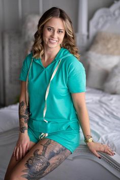 A two piece set, a gorgeous kelly green color. 3" inseam. True to size fit, shown wearing a Medium. Material: 65% Polyester, 35% Rayon Measurement across the bust (armpit to armpit) with the garment laying flat: Small 19" // Medium 20" // Large 21" // XL 22" Shorts, waist measurement side to side without stretching the waistband: Small 14" // Medium 15" // Large 16" // XL 17" Casual Green Tops For Relaxation, Green Cotton Tops For Relaxation, Green Spring Tops For Relaxation, Spring Green Tops For Relaxation, Green Short Sleeve Tops For Lounging, Two Piece Set, Kelly Green, Two Piece Sets, Stretching