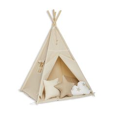 a teepee tent with pillows and stars on the inside, in front of a white background