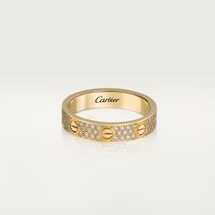 Cartier - LOVE wedding band, diamond-paved - Ring Gold/Diamond - LOVE wedding band, yellow gold (750/1000), set with 88 brilliant-cut diamonds totaling 0.31 carats (for size 52). 4 mm to 5 mm width following metrics. Please note that the carat weight, number of stones and product dimensions will vary based on the size of the creation you order. For detailed information please contact us.