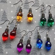 Christmas Light Earrings acrylic material & nickel free hook  hang approx 1.5 inches from ears 💌shipping: -UNTRACKED -shipped within 24 hours -may be delays at this time -♻️eco friendly packaging -🧼sanitized before shipped -❕PLEASE read shop policies before purchasing tags: christmas earrings light bulb earrings free shipping festive earrings holiday earrings light funky earrings Stocking Filler Earrings Geek, Nickel-free Plastic Earrings As Gift, Nickel-free Plastic Jewelry Gift, Green Plastic Earrings For Gifts, Christmas Light Earrings, Festive Earrings, Star Christmas Lights, Ornament Earrings, Christmas Light Bulbs