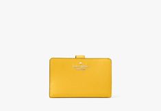 Madison Medium Compact Bifold Wallet | KATE SPADE OUTLET Yellow Wallet, Kate Spade Outlet, Satchel Backpack, Loose Change, Backpack Travel Bag, Kate Spade Wallet, Bifold Wallet, Travel Backpack, New Handbags