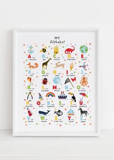 a white framed poster with an animal alphabet