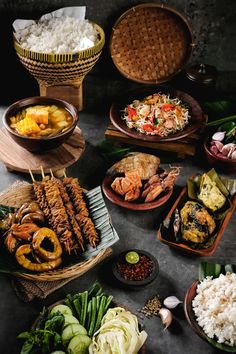 an assortment of food is displayed on a table