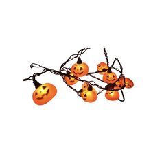 halloween lights with jack - o'- lanterns on them are hanging from the branches