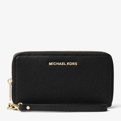 Take Only The Necessities In The Michael Kors Jet Set Large Flat Multi Function Phone Case. This Phone Wallet Phone Case Features An External Zipper Closure, And Detachable Wristlet. Interior Zipper Compartment, Slip Pocket, And Cell Phone Holder. Six Card Slots And One Clear Id Holder. Imported. Measurements: Bottom Width: 7 In Depth: 1 In Height: 4 In Strap Length: 5 12 In Weight: 7 Oz Leopard Tote, Michael Kors Clutch, Michael Kors Wristlet, Blue Wallet, Mk Bags, Wallet Wristlet, Brown Leather Bag, Travel Wallet, Michael Kors Wallet