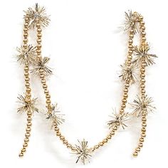 a necklace with gold beads and stars on it