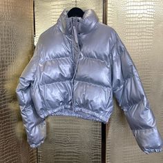 Olivaceous Silver Faux Leather Puffer Jacket New With Tags Trendy Fall Puffer Jacket With Faux Fur Lining, Chic Solid Cropped Jacket For Winter, Trendy Fall Puffer Cropped Jacket, Trendy Puffer Cropped Jacket For Fall, Faux Leather Puffer Jacket, Leather Puffer Jacket, Leather Puffer, Puffer Jacket, Puffer