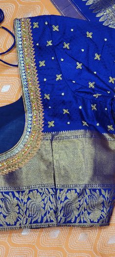 Stunning Kanchi Tissue Silk Saree w/ Blouse in 2 gram Gold Zari, suits every occasion. This Saree comes with a stitched Blouse that can be altered up to size 42. Product ships immediately within the United States Blue Tissue Silk Blouse Piece For Transitional Season, Transitional Wedding Blue Blouse, Festive Tissue Silk Blouse With Self Design, Navratri Tissue Silk Blouse With Self Design, Traditional Tissue Silk Blouse With Pallu, Wedding Blouse In Banarasi Silk With Motifs, Tissue Silk Blouse With Dori Work For Diwali, Wedding Blouse With Banarasi Silk And Motifs, Navratri Self Design Tissue Silk Blouse