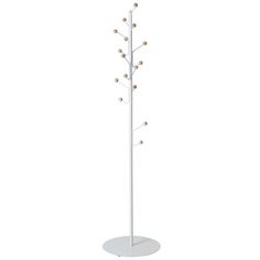 a white coat rack with five balls on it and an umbrella stand in the middle