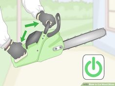 a lawn mower being held up by someone's hand with an arrow pointing to the