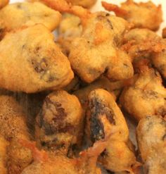 some fried food is on a white plate