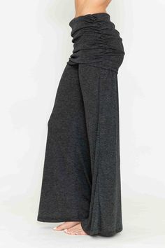 Experience comfort and sophistication with our Chatoyant wide leg palazzo pants, featuring a heather knit rib fabric for an elegant and luxurious touch. The adjustable foldover waistband allows for extra support and can be styled minimally for a high-waist look or folded wide. Perfect for any occasion, these lounge pants offer a comfortable and stretchy pull-on fit with flexible sizing for all women. Made in the USA with a blend of Polyester and Rayon, these pants are suitable for year-round wear, whether for everyday activities or special occasions such as travel, vacations, or resort getaways. Chic Stretch Gray Wide Leg Pants, Chic Gray Stretch Wide Leg Pants, Fall Wide Leg Yoga Pants With Elastic Waistband, Casual Maxi Bottoms For Fall, Gray Stretch Wide Leg Pants For Fall, Stretch Gray Wide Leg Pants For Fall, Casual Maxi Length Bottoms For Fall, Casual Maxi Length Fall Bottoms, Gray Wide Leg Yoga Pants