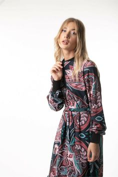 Elevate your wardrobe with our exquisite Paisley Print blouse. The intricate patterns and rich colors of the print will transport you to a world of elegance and sophistication. This piece features versatile Long Sleeves, making it perfect for both work and play. Embrace luxury and style with this unique garment that is sure to turn heads wherever you go. Paisley Print Blouse, Breezy Dress, Sporty Look, Long Maxi, Print Blouse, Printed Maxi, Long Maxi Dress, Paisley Print, Workout Tops