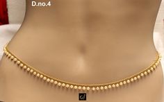 * Beautifully designed gold color belly chain. * can be used with belly dance costumes and saris. *D.no.3-Gold belly chain high quality studded with crystals. Adjustable from 25 to 42 inches Waist. *D.no.4-Gold belly chain high quality studded with crystals. Adjustable from 25 to 42 inches Waist. *D.no.5-Gold belly chain high quality studded with crystals. Adjustable from 25 to 42 inches Waist. Gold Pearl Chain Body Chain For Festival, Elegant Gold Beaded Waist Chain, Elegant Gold Waist Chain For Festivals, Saree Chain, Waist Chain Indian, Silver Anklets Designs, Chain Jewellery, Indian Wedding Jewelry Sets, Neck Pieces Jewelry