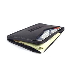 For those who like to keep their wallets in their front pockets. Slim enough to comfortably carry and large enough to fit your essential cards and some cash. Black Bifold Card Holder For Everyday Use, Black Bifold Card Holder For Everyday Carry, Black Bifold Coin Purse With Card Slots, Black Wallet With Flat Pocket, Black Card Holder With Coin Pocket For Daily Use, Black Trifold Wallet With Card Slots For Everyday, Black Wallets With Card Slots For Everyday Carry, Bifold Card Holder With Flat Pocket For Daily Use, Black Wallets With Card Slots For Everyday