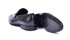 Corrente Leather Buckle Loafer Black Elegant, Supple Nappa Leather slip-on Loafer from the Corrente collection features soft Calfskin lining, Silvertone Bit Hardware detail, a clean welt and a full Leather Sole! . Cordovan Shoes, Buckle Loafers, Shoe Horn, Shoe Tree, Leather Buckle, Suede Shoes, Nappa Leather, Leather Slip Ons, Shoe Box