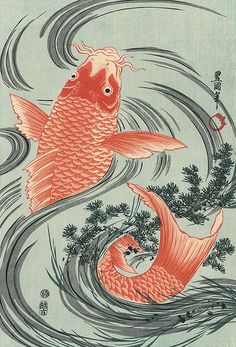 two fish swimming in the water near each other