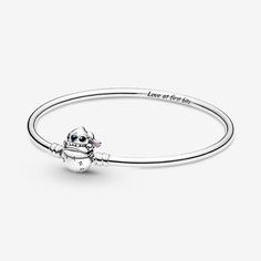 Our classic Pandora Moments bangle gets an update thanks to Disney's much-loved Stitch. The mischievous character from Disney's Lilo & Stitch is biting the ball clasp of this sterling silver bangle (incorporated as part of the clasp). The message "Love at first bite" is engraved on the inside of the bangle. The bangle can be styled with up to 16-18 charms, dangle charms or pendants - it's the perfect home for your Disney x Pandora charm collection. - Pandora Moments Disney Stitch Biting Clasp Bangle - Enamel / Sterling silver / Multicolor - Sz. 8.3 in Mischievous Character, Charms Disney, Pandora Bangle, Love At First Bite, Lilo Y Stitch, Lilo Et Stitch, Pandora Disney, Charm Collection, Sterling Silver Bangle