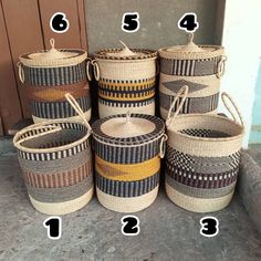 several baskets are shown with numbers on the bottom and one is labeled in black letters