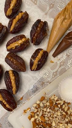 some nuts are sitting on a table next to an ice cream cone