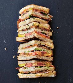 several sandwiches stacked on top of each other