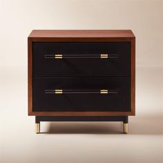 a black and gold dresser with two drawers