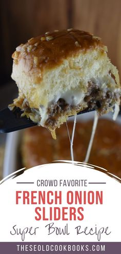 a piece of french onion sliders on a spatula with the words crowd favorite